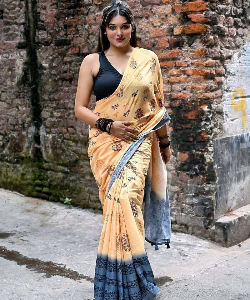Orange linen printed zari work saree with blouse