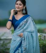 Light blue linen printed zari work saree with blouse