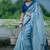 Light blue linen printed zari work saree with blouse