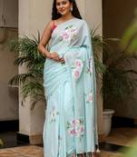 Light blue linen printed zari work saree with blouse