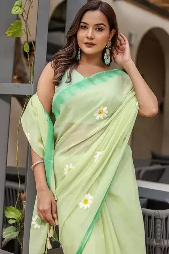 Light green linen printed zari work saree with blouse