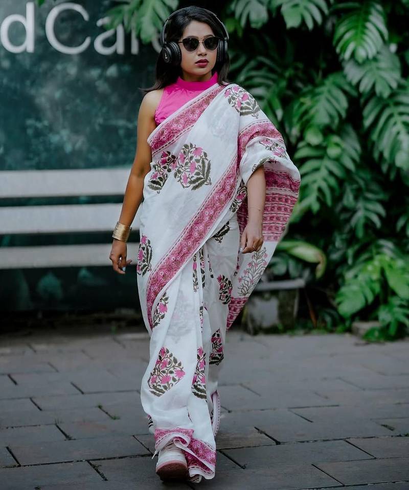 White linen printed zari work saree with blouse