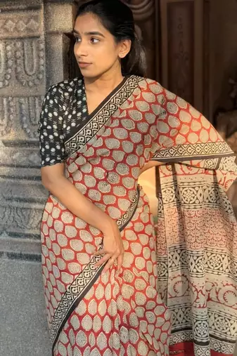 Orange linen printed zari work saree with blouse