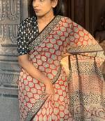 Orange linen printed zari work saree with blouse
