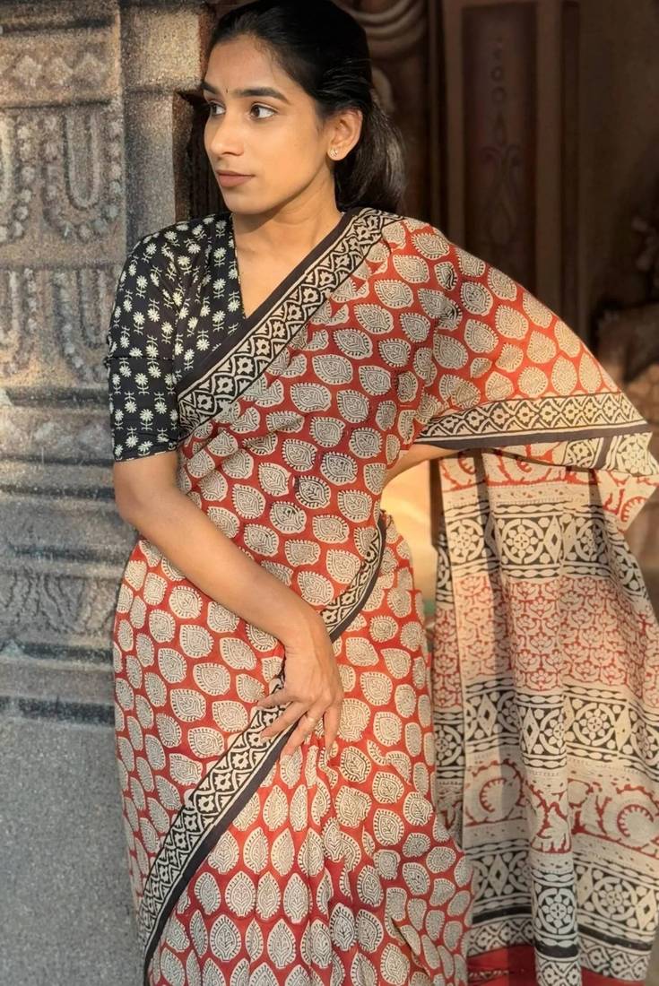 Orange linen printed zari work saree with blouse