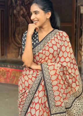 Orange linen printed zari work saree with blouse 2