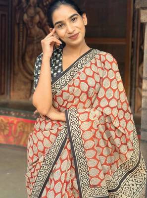 Orange linen printed zari work saree with blouse 3
