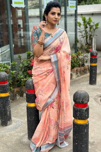 Pink linen printed zari work saree with blouse