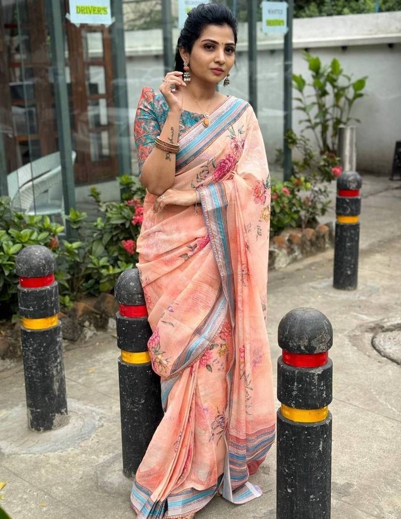 Pink linen printed zari work saree with blouse
