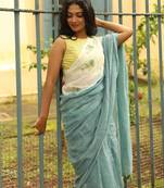 Light blue linen printed zari work saree with blouse
