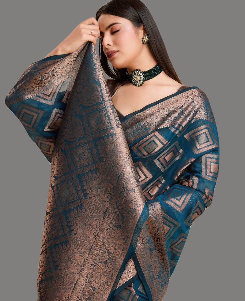 Dark blue organza woven zari work saree with blouse