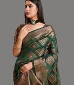 Green organza woven zari work saree with blouse