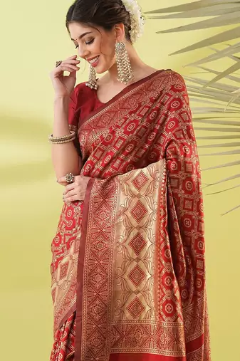 Maroon pure silk woven zari work saree with blouse