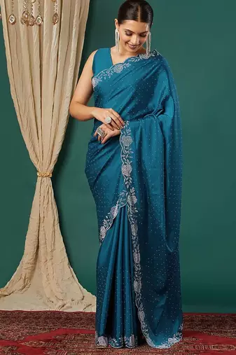 Light blue satin woven zari work saree with blouse