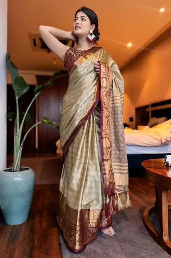 Beige blended cotton woven zari work saree with blouse