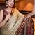 Beige blended cotton woven zari work saree with blouse