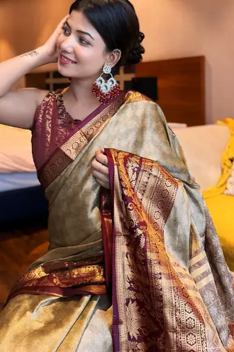 Beige blended cotton woven zari work saree with blouse