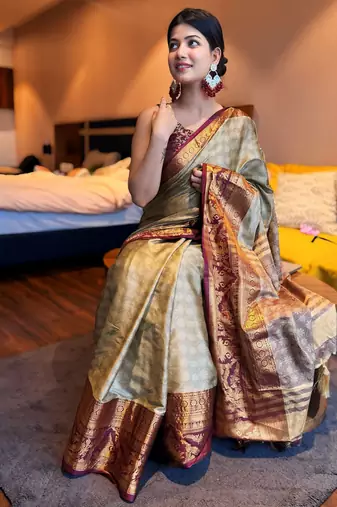 Beige blended cotton woven zari work saree with blouse