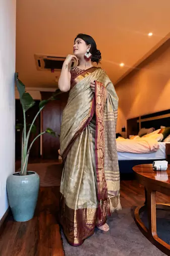 Beige blended cotton woven zari work saree with blouse