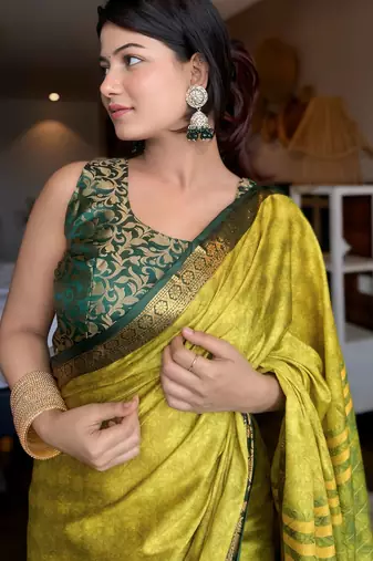 Light green blended cotton woven zari work saree with blouse