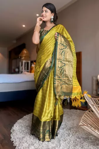 Light green blended cotton woven zari work saree with blouse
