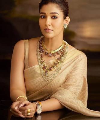 Beige tissue woven zari work saree with blouse 2