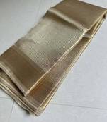 Beige tissue woven zari work saree with blouse
