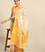 Cream gold tissue woven zari work saree with blouse