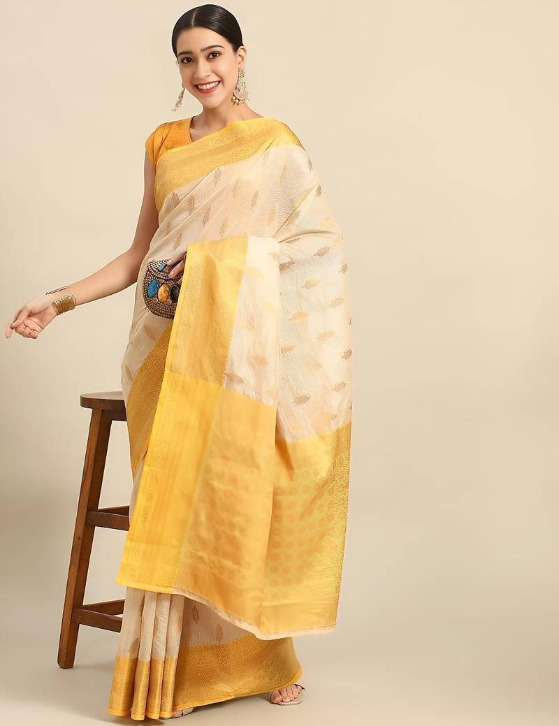 Cream gold tissue woven zari work saree with blouse