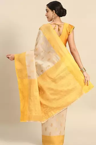 Cream gold tissue woven zari work saree with blouse