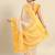 Cream gold tissue woven zari work saree with blouse