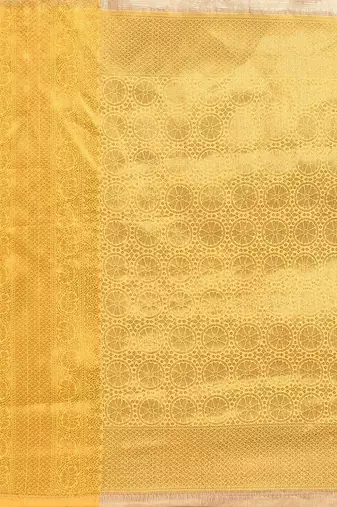 Cream gold tissue woven zari work saree with blouse