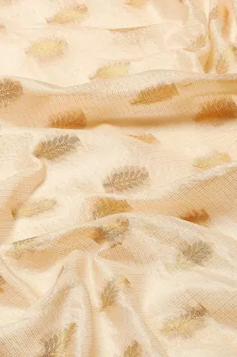 Cream gold tissue woven zari work saree with blouse