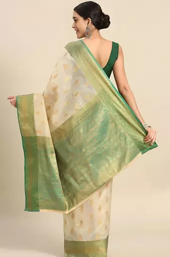 Cream gold tissue woven zari work saree with blouse