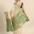 Cream gold tissue woven zari work saree with blouse