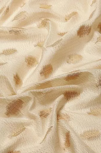 Cream gold tissue woven zari work saree with blouse