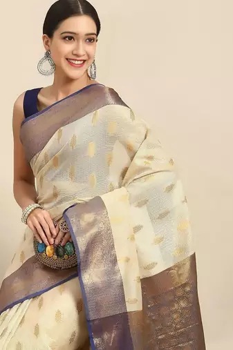 Cream dark blue tissue woven zari work saree with blouse