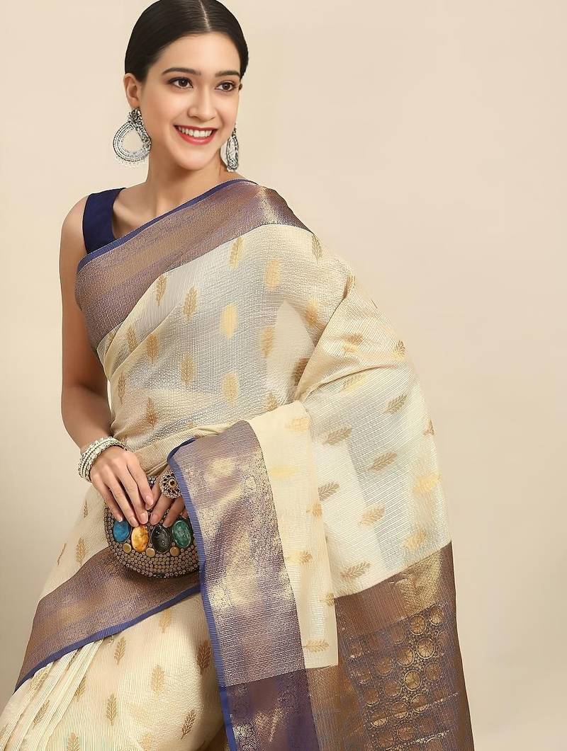 Cream dark blue tissue woven zari work saree with blouse