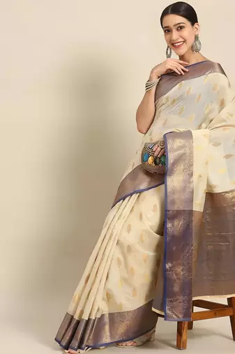 Cream dark blue tissue woven zari work saree with blouse
