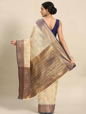 Cream dark blue tissue woven zari work saree with blouse 3