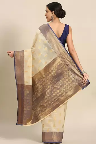 Cream dark blue tissue woven zari work saree with blouse