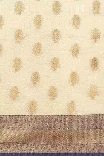 Cream dark blue tissue woven zari work saree with blouse