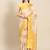 Cream gold tissue woven zari work saree with blouse