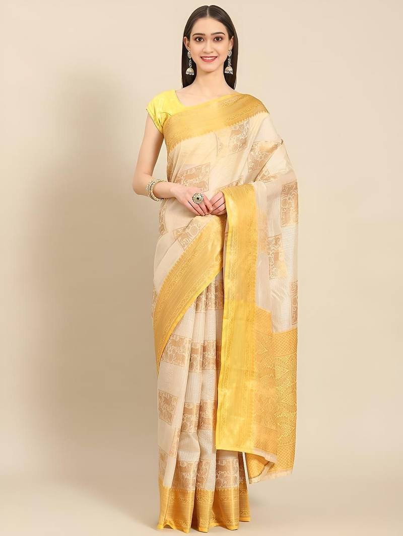 Cream gold tissue woven zari work saree with blouse