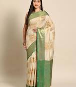 Cream green tissue woven zari work saree with blouse