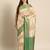 Cream green tissue woven zari work saree with blouse