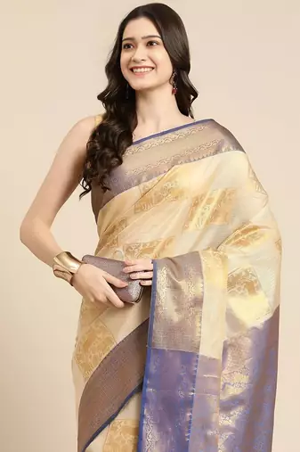 Cream dark blue tissue woven zari work saree with blouse