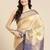 Cream dark blue tissue woven zari work saree with blouse