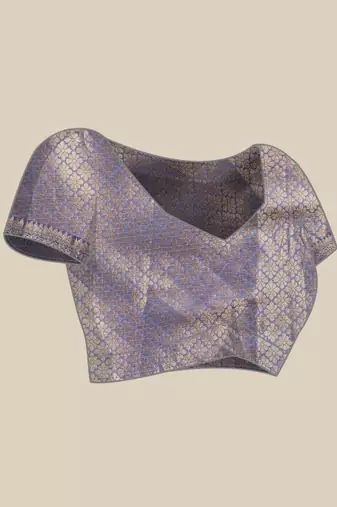 Cream dark blue tissue woven zari work saree with blouse