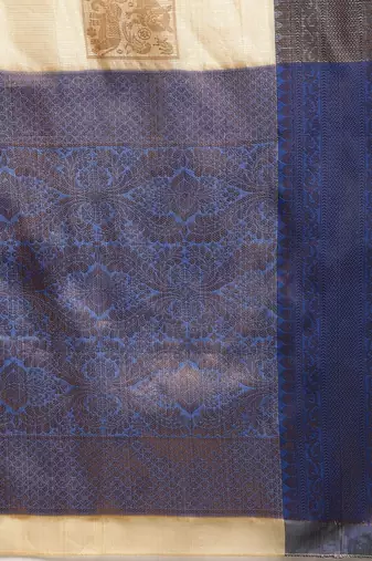 Cream dark blue tissue woven zari work saree with blouse